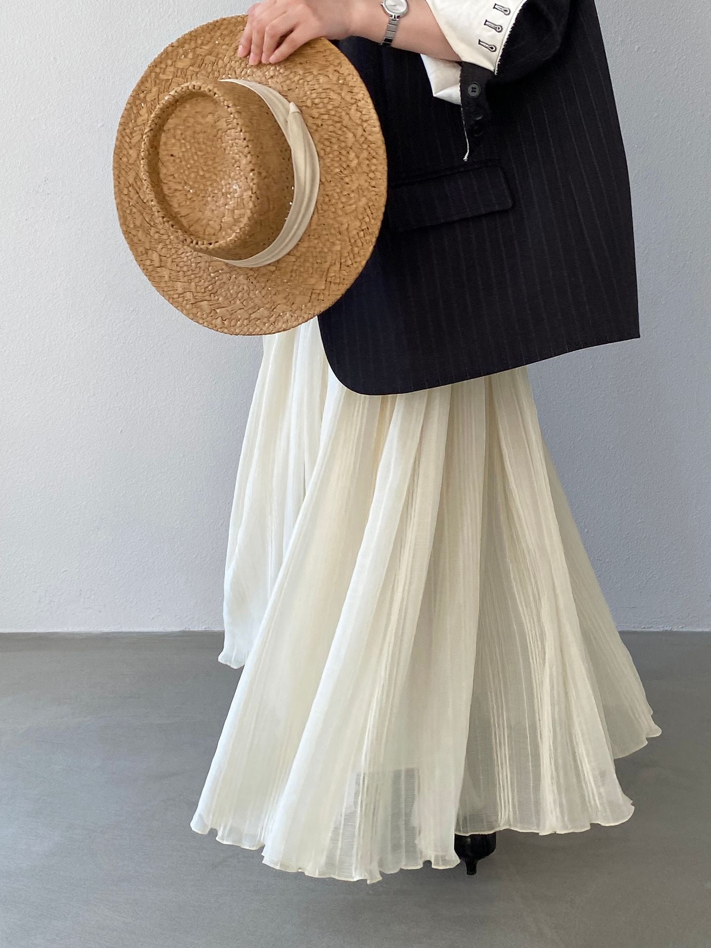 早春感重工壓褶拼接木耳邊大擺半身裙