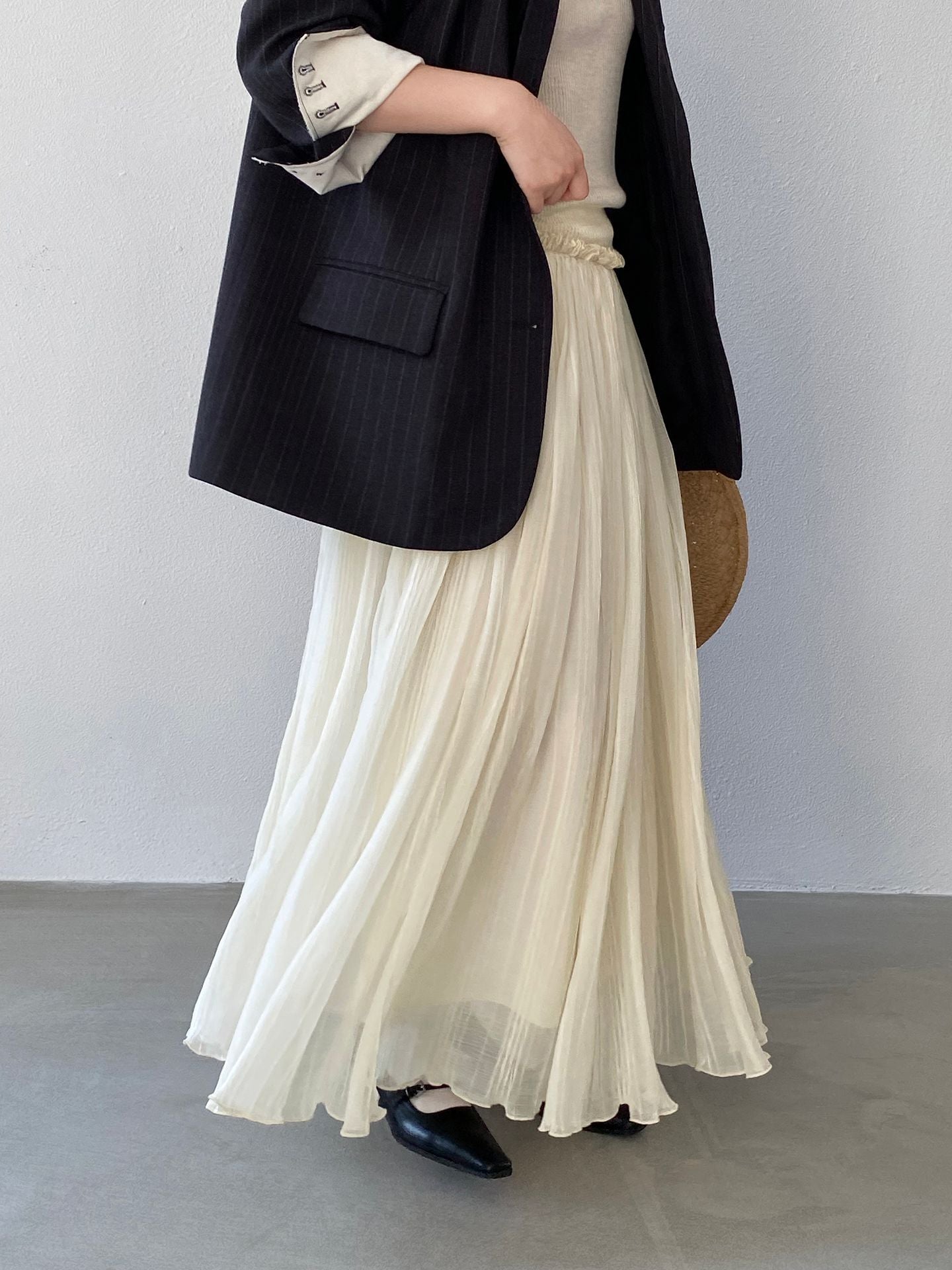 早春感重工壓褶拼接木耳邊大擺半身裙