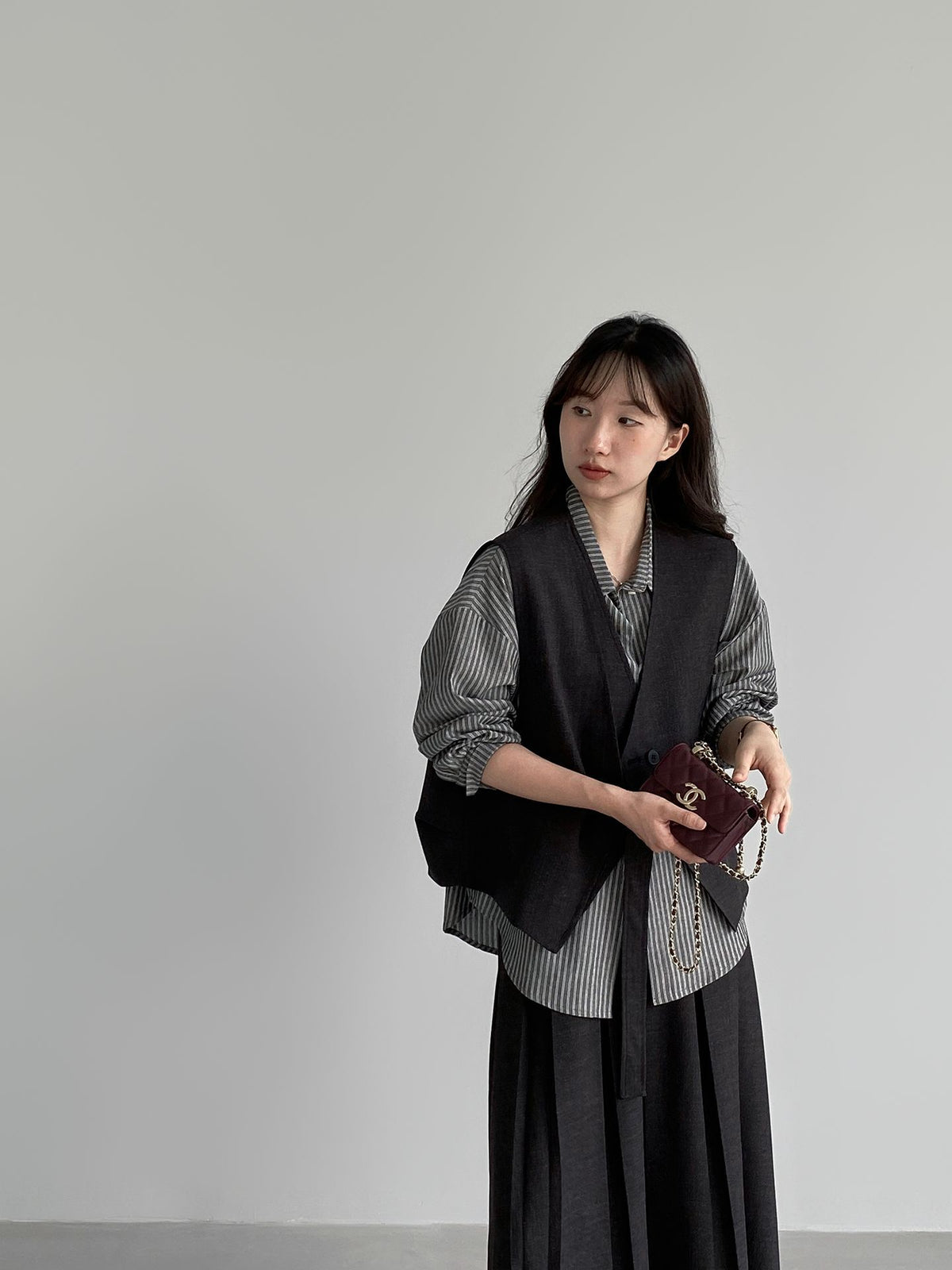 韓系氣質雙門襟馬甲外套＋百褶半身裙-兩件式套裝
