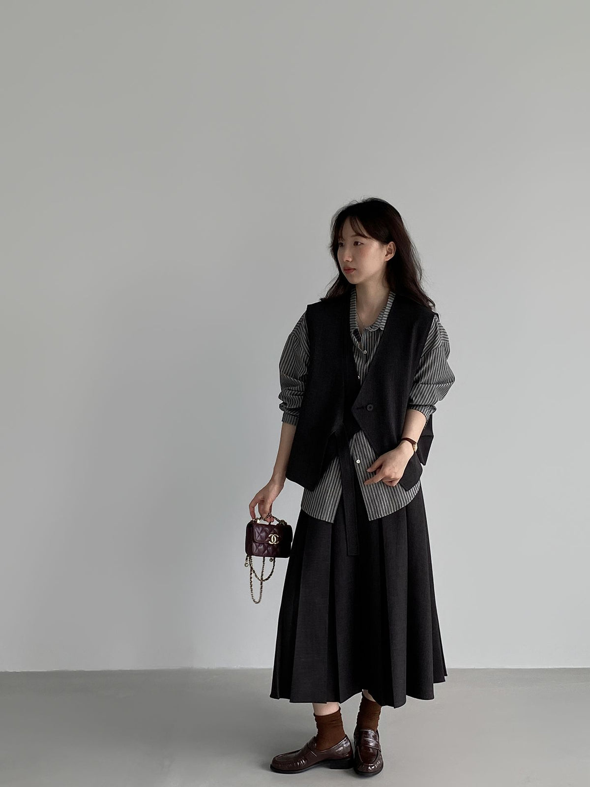 韓系氣質雙門襟馬甲外套＋百褶半身裙-兩件式套裝